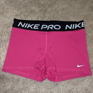 Pink Nike pro shorts size L
